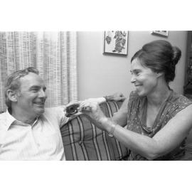 Dallas Hayden feeds husband, Bill, medicine to treat his laryngitis, Ipswich, September 1980