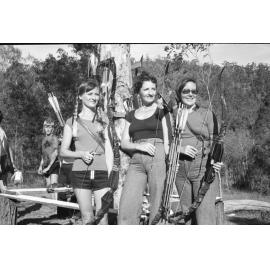 Wendy Godfrey and two unidentified women with bows and arrows for bowhunting, Ipswich, April, 1978