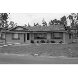 One story brick house with a dutch gable roof and wide windows, Collingwood Park, 25th October 1977
