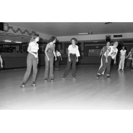 Women roller skating, thought to be at Skate-A-Way, Ipswich, September 1980