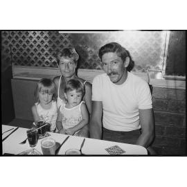 Unidentified family dining at a restaurant, Ipswich, January 1986