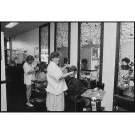 Hairdressing salon with clients, Ipswich, 1986