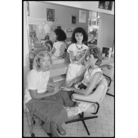 Hairdressing salon with a client, Ipswich, 1986