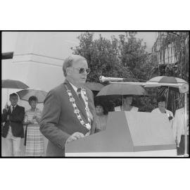 Ipswich Mayor Des Freeman addressing the Crew of H.M.A.S. Ipswich, during a 'Freedom of Entry to the City' event, Nicholas Street, Ipswich, January 1986