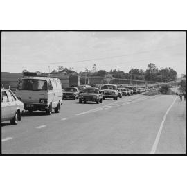 Traffic jam on way into Brisbane outside Redbank Plaza, following a fire in a ute, Ipswich, 1986 