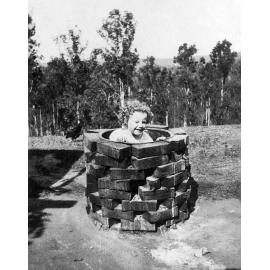 Valma Jones in a copper boiler at Oakleigh (house), Redbank Plains, Ipswich, ca. 1921