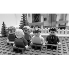 Brickswich version of a family group, outside a home in Carberry Street, Bundamba, from the 1940s