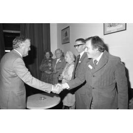 Premier Joh Bjelke-Petersen with unidentified Ipswich residents during a formal visit, Ipswich, August 1980