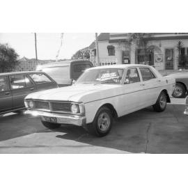 Ford Falcon sedan, car advertisement for Currie Motors, Ipswich, August 1980
