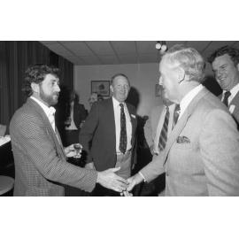 Premier Joh Bjelke-Petersen meeting with unidentified men during a formal visit, Ipswich, August 1980