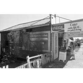 Fire damage to an unidentified convenience store, Ipswich, August 1980