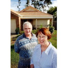 Unidentified man and woman at Springfield home, Springfield, December 2003