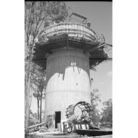 Unidentified men working on a water tower, Ipswich, September 1980