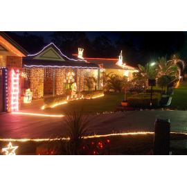 Houses lit up for Christmas at Collingwood Park, Ipswich, December 2003