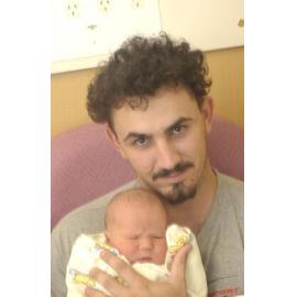 Man with newborn baby (Mia Dean-Brooks), Ipswich, December 2003