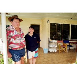 Doug and Teresa Slater (daughters) of Tivoli having gotten their phone lines down, Ipswich, December 2003