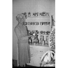 Unidentified woman in a shop, thought to be in Richlands Tavern, Ipswich, Queensland, September 1980