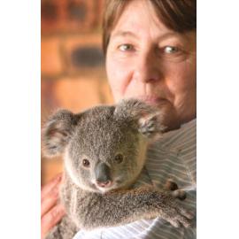 Helen Darbellay holding a koala, Ipswich, September 2003