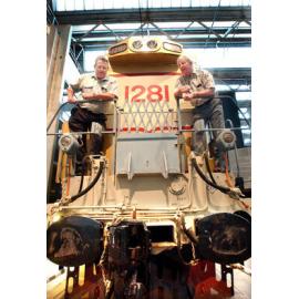 Two unidentified men on a train, Ipswich, September 2003