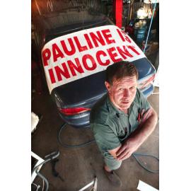 Geoff Walkden showing off a banner on a car about Pauline Hanson, Ipswich, September 2003