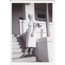 Nurse J Kerle on steps Trumpy House, Ipswich Hospital, Ipswich, 1950s