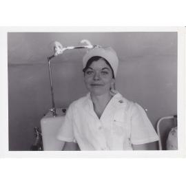 Nurse Denise Warren in ward, Ipswich Hospital, Ipswich, 1950s