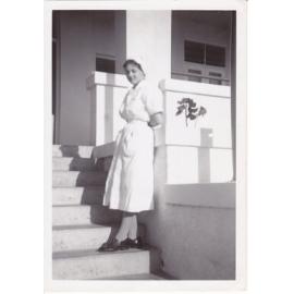 Nurse Sue Gardiner on steps Trumpy Home, Ipswich General Hospital, 1950s