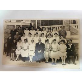 Hospital staff outside original building, 1930s