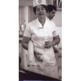 Margaret Boulter, carrying prosthesis, Ipswich Hospital, Ipswich, 1970s