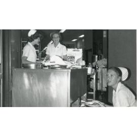 Meal Service, Enrolled Nurse Ruhl  Betty Ball. ?, with meal trolley, 1970s