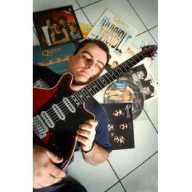 James Barber showing off his Queen Musical collection and electric guitar, Ipswich, June 2003