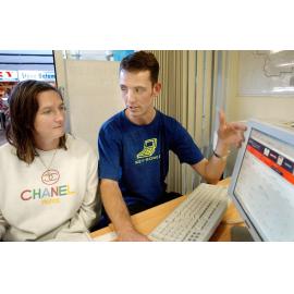 Jared Dart introduces a website to Karen Addison, Goodna, June 2003