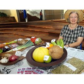 Elspeth Douglas with an assortment of exotic vegetables and other cooking ingredients at the multicultural festival, Ipswich, April 2003