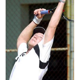 Scott Barlow, local Ipswich player in a tennis match, Ipswich, April 2003