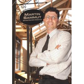 Martin Sammut in front of his accounting firm sign, Ipswich, November 2003