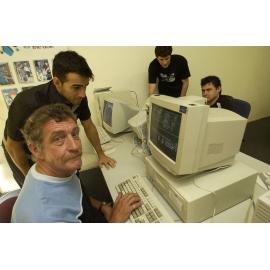 Ashley Kay, Martin Parfitt, Adrian Arcidiacono and Christopher Suthers on computers, Ipswich, November 2003