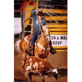 Thought to be either Roy Kelly or Marcus Jones, participating in the West Moreton Anglican College's rodeo event, Ipswich, November 2003