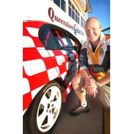 Ipswich Jets captain, Jamie Mathiou at the Queensland Raceway for a Queensland Times' fathers day promotion, Willowbank, Ipswich, August 2003