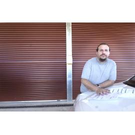 Tony Mifsud and a DIY shed, Ipswich, August 2003 