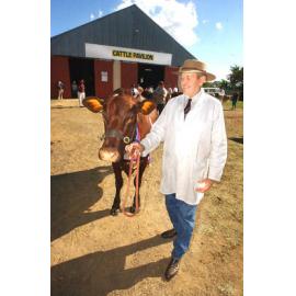 Neil Shelton with cow, Vuegon Daisy the third at the Ipswich show, Ipswich, May 2003