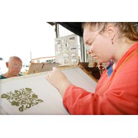 Cheryl Holland doing cross-stitching at the Ipswich show, Ipswich, May 2003