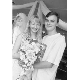 Unidentified man and woman thought to be in a bridal boutique, Ipswich, March 1995