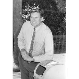Unidentified man with a refuse bin, Ipswich, March 1995