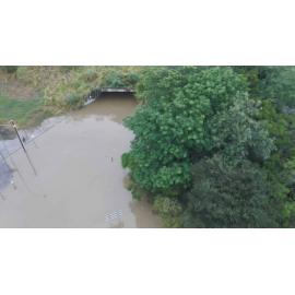 Drone images of the Bremer River in flood, under the railway bridge, northern end of Marsden Parade, Ipswich, March 2025