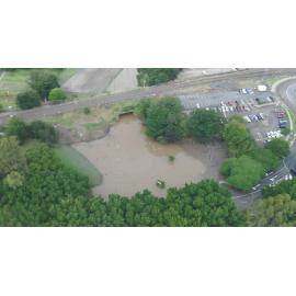Drone images of the Bremer River in flood, northern side of Marsden Parade, Ipswich, March 2025