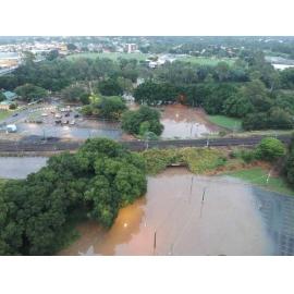 Drone image looking towards the Bremer River in flood, from Marsden Parade, Ipswich, March 2025