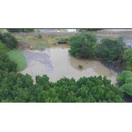 Drone image of the Bremer River in flood, northern side of Marsden Parade, Ipswich, March 2025