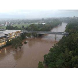 Drone image of the David Trumpy Bridge and Bremer River in flood, Ipswich, March 2025