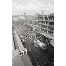 Removing stock from the hardware store, following the  Reid's (Cribb & Foote) fire, Bell Street, Ipswich, August 1985
