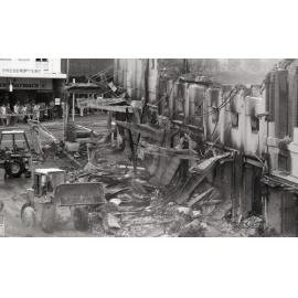Clearing debris after the Reid's (Cribb & Foote) fire, Bell Street, Ipswich, August 1985
